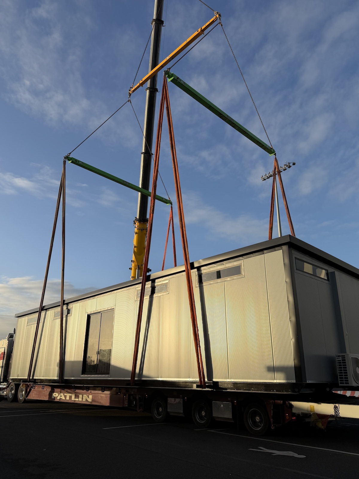 Portable Building by Portable Industries on Crane lift